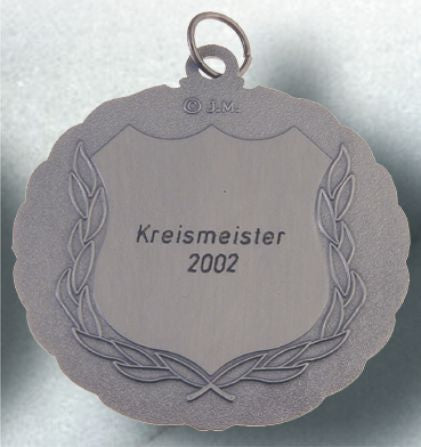 Engravings on medals (1- and 2-line alternating text)